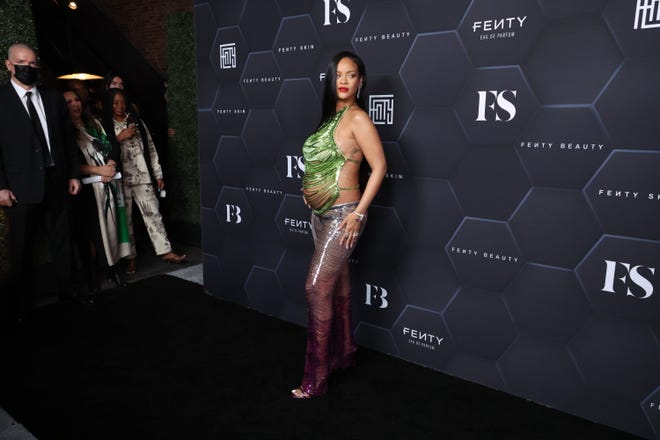 Rihanna has welcomed her first child with rapper A$AP Rocky. The star is seen here posing for a picture as she celebrates her beauty brands Fenty Beauty and Fenty Skin at Goya Studios on Feb. 11, 2022, in Los Angeles.