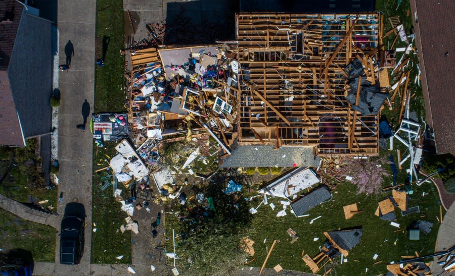 A home on Bohannon Station Road in the Glenmary subdivision in southeastern Louisville had its roof ripped off in Wednesday night's storms. April 14, 2022