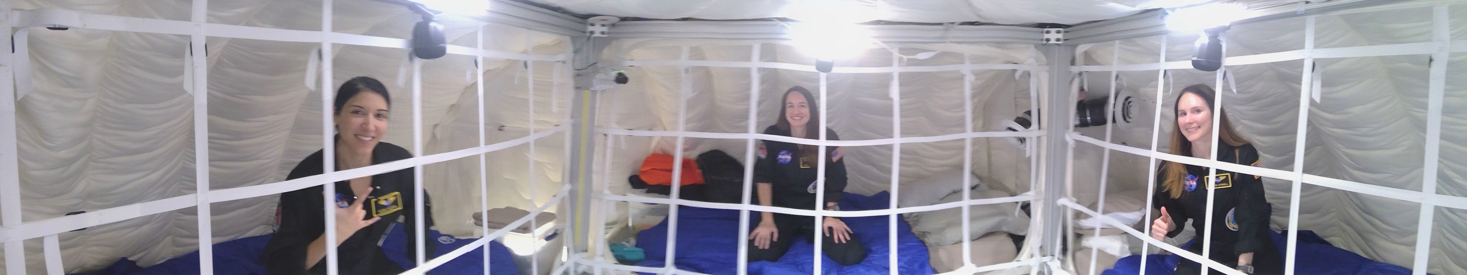 Monique Garcia (from left), Madelyne Willis and Lauren Cornell hang out in their bunks inside the HERA module. Cornell says that any time one of them rolled over, all the bunks would shake.