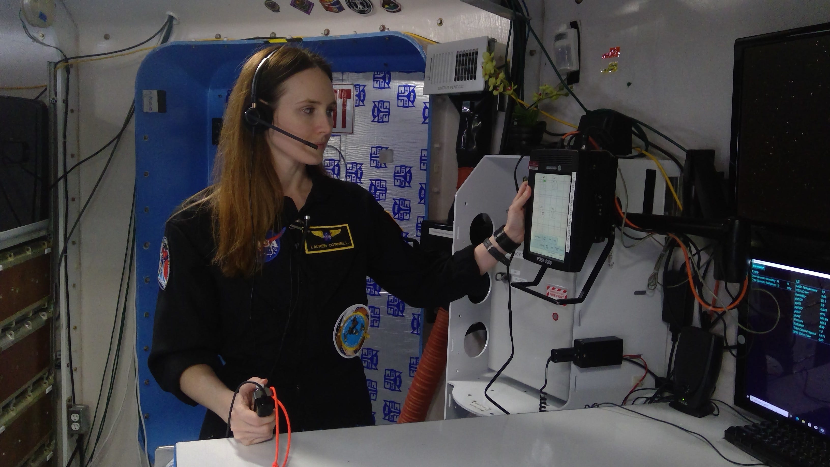 Lauren Cornell works in the HERA environment. Simulation astronauts like Cornell are often under a great deal of stress conducting their missions, and some researchers hope that studying that stress can give them a better understanding of the immune system.