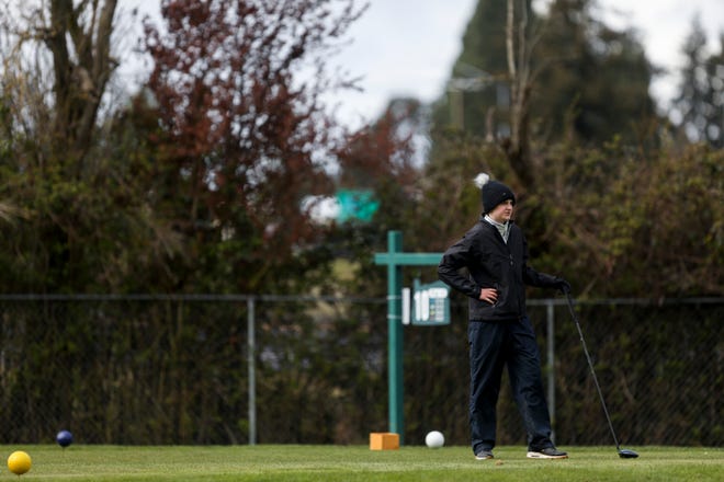 South Salem's Madelyn Dustin looks toward the green during the MVC league match at Santiam Golf Club on Wednesday, April 13, 2022 in Aumsville, Ore. 