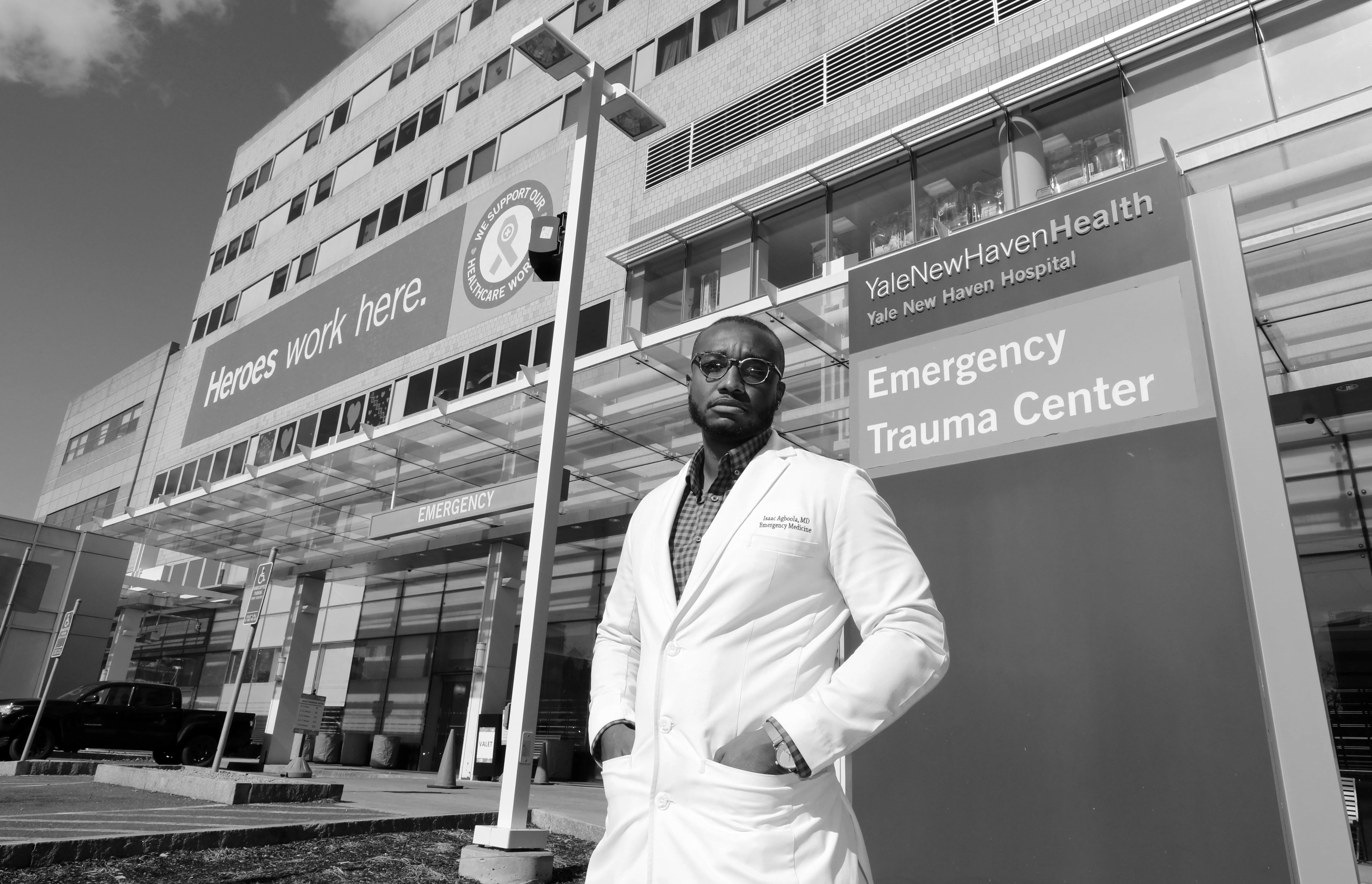 Isaac Agboola, M.D., chief resident at Yale New Haven Hospital in New Haven, Connecticut, is pictured at the hospital March 3, 2022. He is a groundbreaking researcher into racial disparity in the use of restraints on patients in hospital settings.