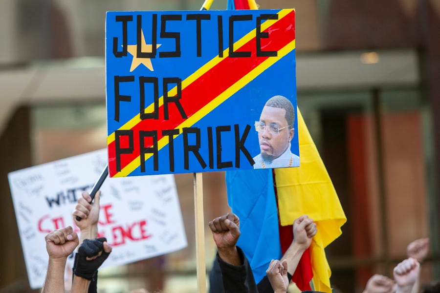 Police reform activists rally for Patrick Lyoya in Grand Rapids, Mich., on April 12, 2022.