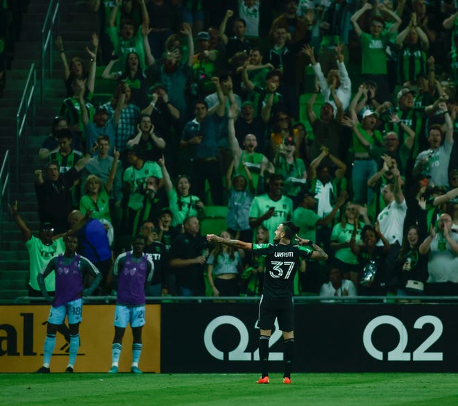 Austin FC forward Maxi Urruti treats the crowd to his "bow and arrow" after scoring the only goal in a win over Minnesota United on Sunday at Q2 Stadium. The offseason signee has scored twice this season.