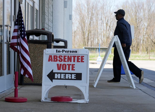 April 14, 2022; Delaware, Ohio, USA;  A man walks into a training for poll workers at the Delaware County Board of Elections. Mandatory Credit: Barbara J. Perenic/Columbus Dispatch