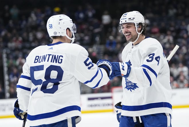 Toronto center Auston Matthews, right, leads the NHL with 58 goals.