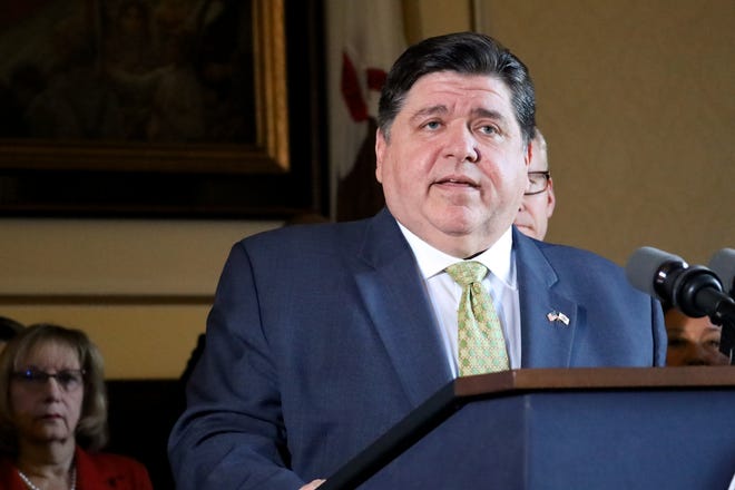 Gov. JB Pritzker describes the state's budget at an April 10 Capitol press conference