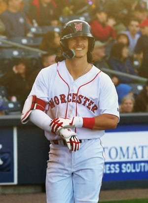 Worcester Red Sox third baseman Ryan Fitzgerald smiles after hitting a two-run home run in the seventh inning of the home opener at Polar Park Tuesday, April 12, 2022. .