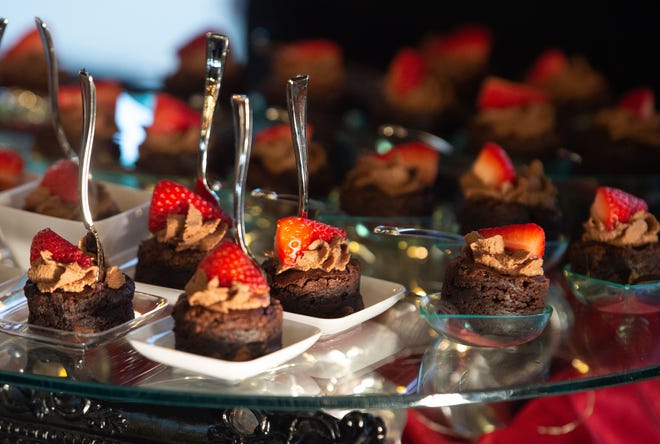 Tasty chocolate treats from Hotel Capstone are on display during the Death by Chocolate fund raising event for Counseling Service of West Alabama  Thursday, April 14, 2022, at Tuscaloosa River Market. Gary Cosby Jr./Tuscaloosa News  