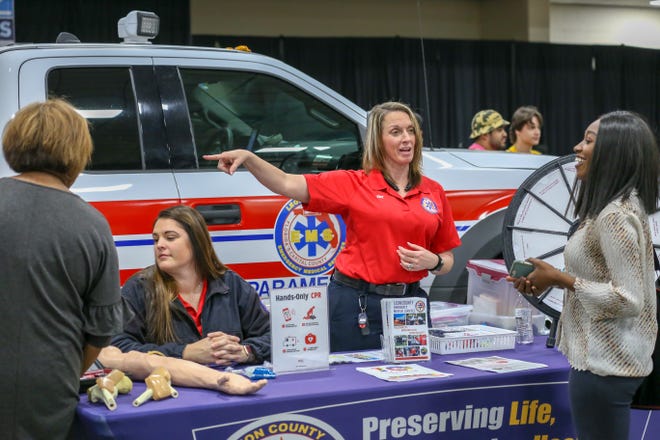 Leon County Emergency Medical Services (EMS) discusses medical career paths with students during the Leon Works Expo.