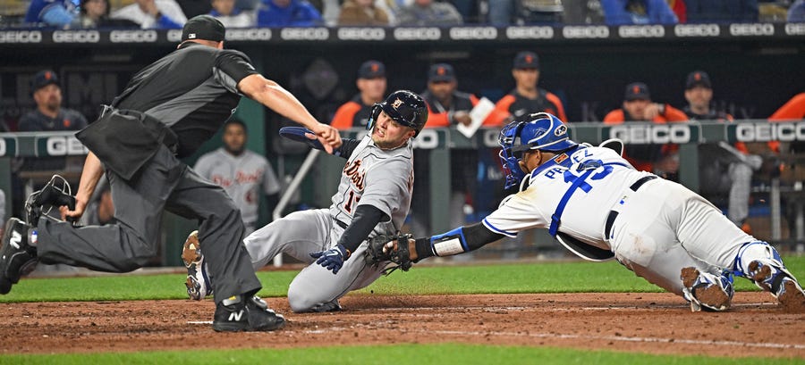 April 14: The Detroit Tigers' Austin Meadows gets tagged out at home plate by Kansas City Royals catcher Salvador Perez during the sixth inning at Kauffman Stadium. The Tigers won the game, 4-2.