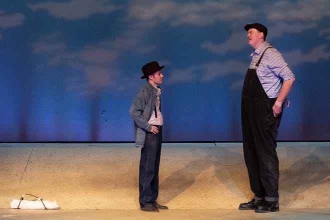 In the beginning of the play "Of Mice and Men," Lennie (right), played by Daniel Gilchrist, and George (left), played by Matt Briden, slowly begin to introduce their characters and relationship as they travel together. The production opened Friday evening at the Topeka Civic Theatre and runs through April 30.