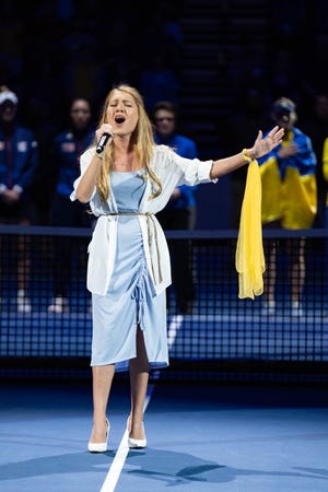 Ukraine native and Flat Rock resident Julia Kashirets sings the National Anthem of Ukraine during the opening ceremony of the first day of the 2022 Billie Jean King Cup on April 15, 2022.