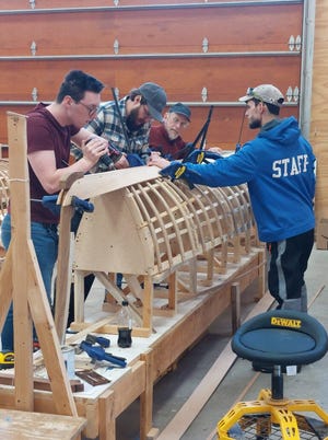 Students at the Great Lakes Boat Building School build a wooden boat, an iconic mode of transportation around Les Cheneaux Islands in Lake Huron.