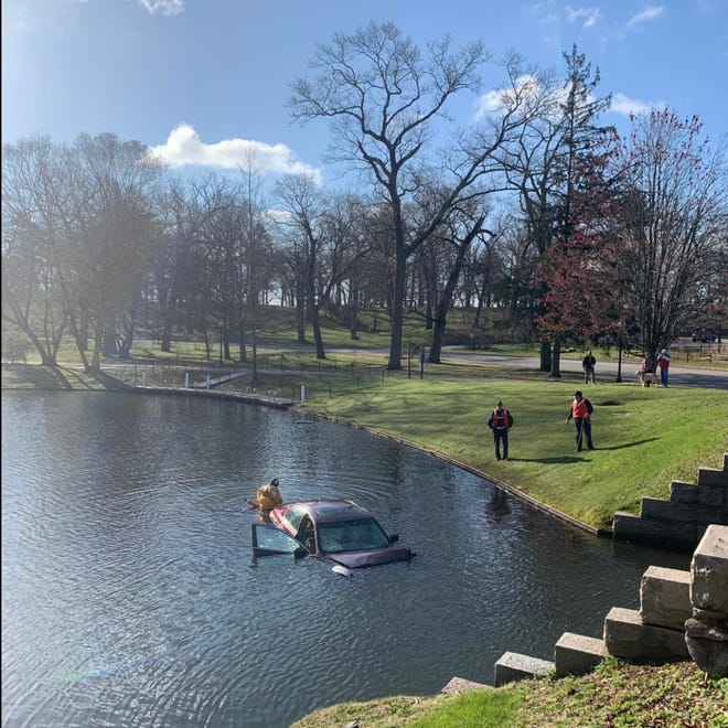 Firefighters determined there was no one in the submerged car at Roger Williams Park.