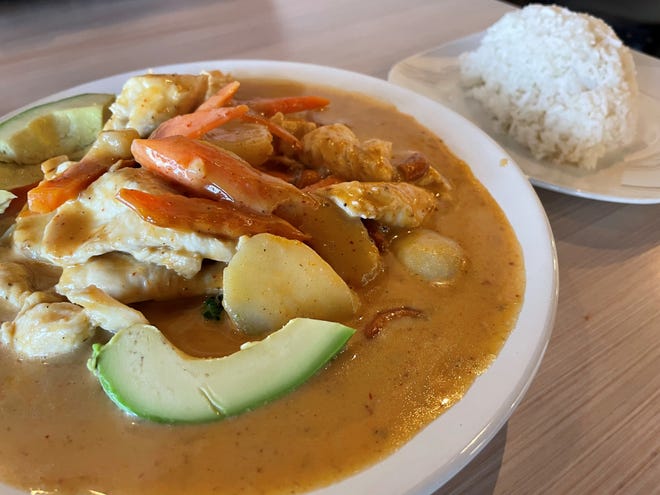 The masaman curry at Pin Thai features a choice of protein (in this case, chicken), avocado, broccoli, carrots, cashews, potatoes and onions.