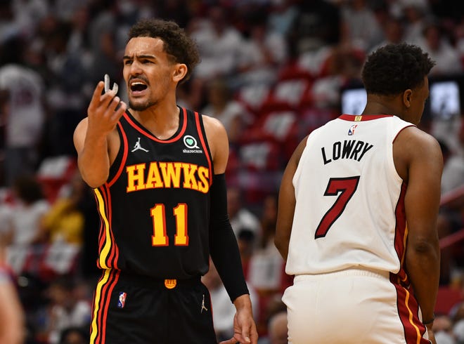 Hawks guard Trae Young has a few words for the officials in the first half.