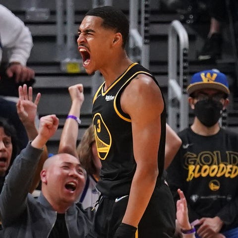 Jordan Poole gets fired up after a big bucket in t
