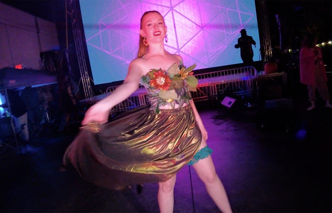 A model walks the runway at the Monster Mash Fashion Bash at Paloma Park in Athens, Ga. on Oct. 29, 2021.