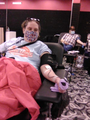 Erin Muzechuk recently reached her goal of donating 10 gallons of blood.