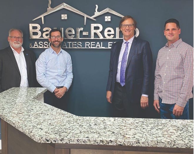 (from left): Steve Adams, Marc Reno, Dan Elsea and Joe Bauer of Bauer-Reno & Associates Real Estate and Real Estate One Family of Companies.