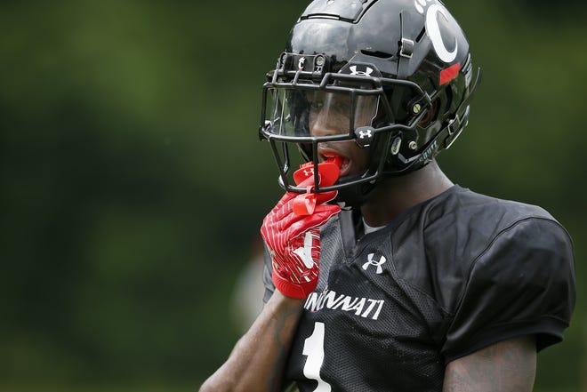 Cincinnati Bearcats cornerback Ahmad Gardner (1) resets between plays during practice at the Higher Ground training facility in West Harrison, Ind., on Monday, Aug.  9, 2021.