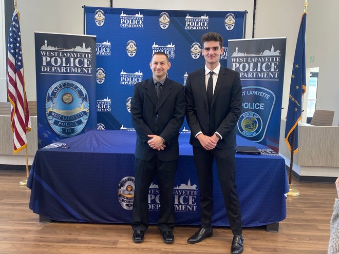 Bryan Norris (left) and Greyson Ennis (right) after being sworn in as probationary police officers for the West Lafayette Police Department. April 19, 2022