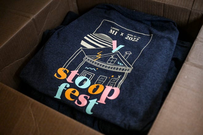 A box of this year's StoopFest T-shirts arrived in time for a music festival planning meeting on Monday, April 18, 2022, at The Avenue in Lansing.