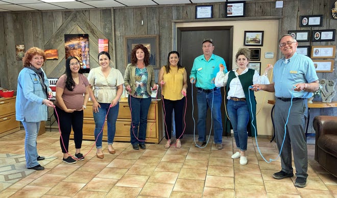 Staff at Sun Country Realtors are jumping for joy with the new jump ropes they donated to the Lemonade Day swag bags that will be given away at Saturday's Kick-Off Event from noon to 3 p.m. at the Starmax Restaurant.