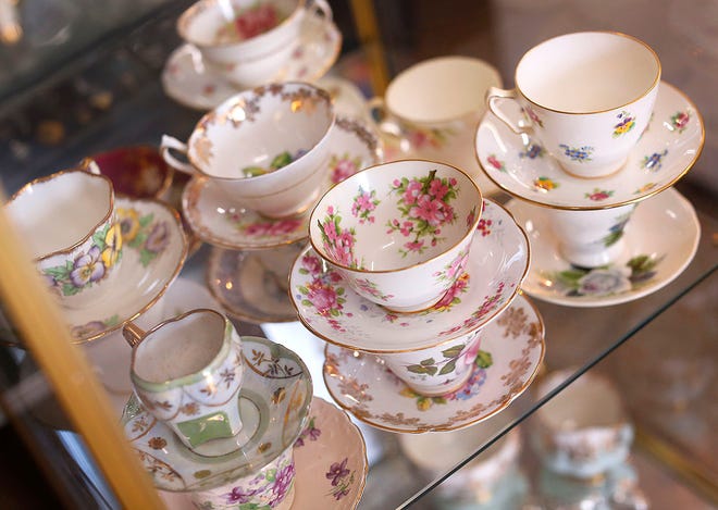 Tea cups and saucers at Franklin Street Finds, an antique and bric-a-brac store in Quincy, Wednesday, April 20, 2022.