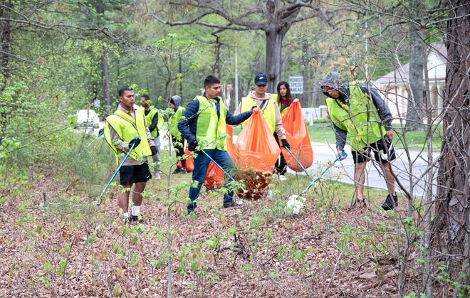 Fort Lee soldiers help cleanup trash as part of a city cleanup in April 2022.