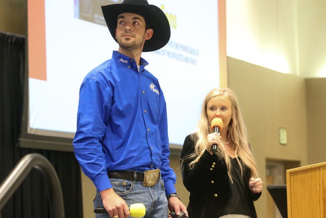 Caleb Thomas and Jordyn Barker speak to judges and a crowd of attendees at Texas A&M University-Corpus Christi about a business opportunity Wednesday, April 20, 2022. The two competed in the institution's Ideas Challenge showcase.