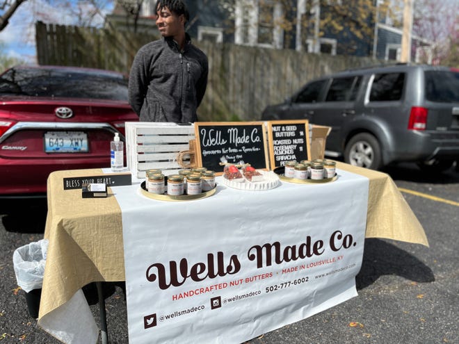 Mason Wells sells products crafted by his mother and owner of the business.