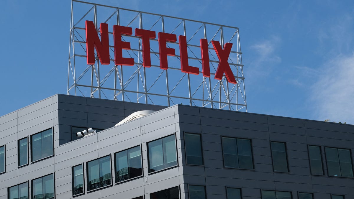 In this file photo taken on March 02, 2022, the Netflix logo is displayed on top of their office building in Hollywood, California.