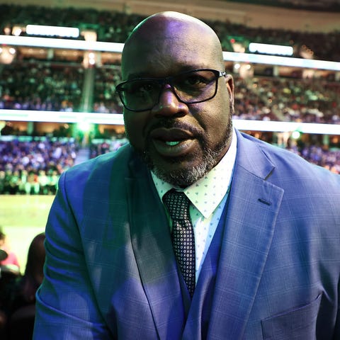 Shaquille O'Neal attends the Slam Dunk Contest as 