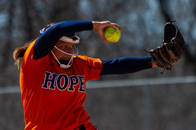 Hope's Avery Slancik winds up for a pitch during a game against Calvin Thursday, April 21, 2022, at Calvin University. 
