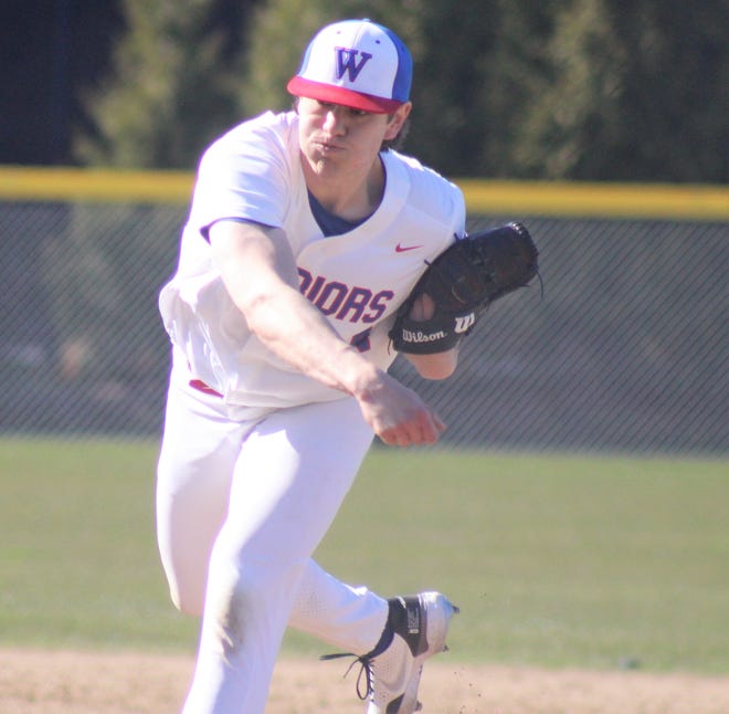 Winnacunnet High School's Joe Allen delivers a pitch during the first inning of Wednesday's Division I game against Concord. Allen earned the win, allowing seven hits and two runs while striking out seven. Winnacunnet won the game, 9-4 and improved to 3-0 on the season.