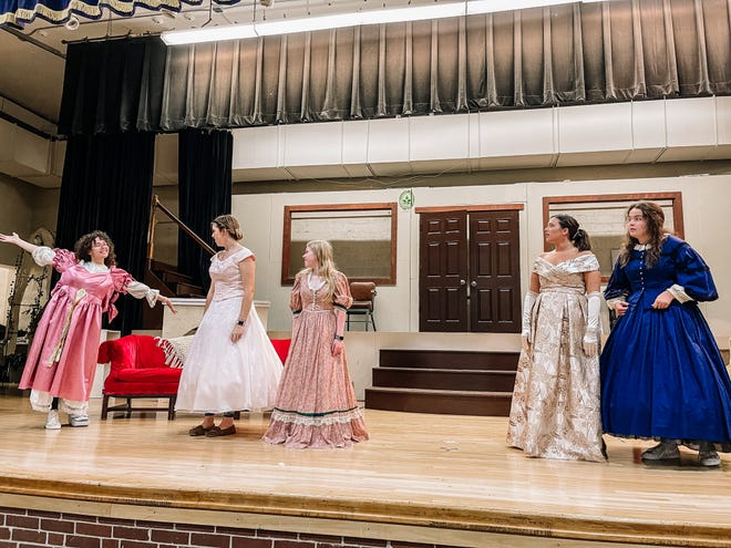 Olivia Gasnow (Amy March), Madison Roberts (Jo March), Sydney Hollifield (Beth March), Brylee Crawford (Meg March) and Meah Bell (Marmee) in a rehearsal of Little Women, the music at Gibbs High School, April 21, 2022.