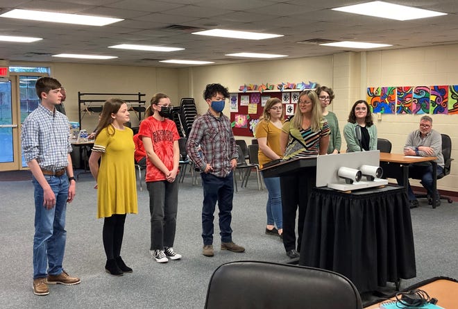 Richmond Business Professionals of America sponsor Denise Selm introduces her students at the April 13, 2022, Richmond school board meeting.