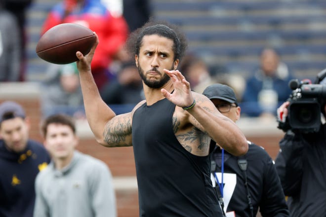 Former Nevada quarterback Colin Kaepernick passes during halftime at the University of Michigan's spring football game at Michigan Stadium on April 2. Kaepernick served as an honorary captain for the game.
