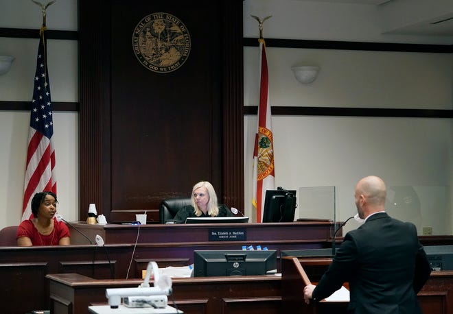 Markreash Muldrow testifies at her husband, Kentay Thomas', sentencing before Judge Elizabeth Blackburn at the Justice Center in Daytona Beach, Friday, April 22, 2022.
