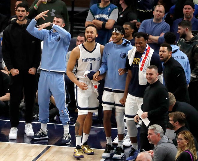 Memphis Grizzlies players celebrate as they start to win against the Minnesota Timberwolves during the second half of game three of the first round for the 2022 NBA playoffs Thursday, April 21, 2022, at Target Center in Minneapolis, Minn. The Memphis Grizzlies defeated the Minnesota Timberwolves 104-95.