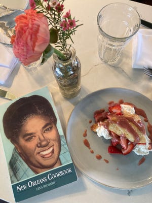 Lena Richard New Orleans Cookbook, from the 1940s (that Bird & Bottle Owner Marjorie Tarter tracked down) with the slightly tweaked strawberry shortcake from her recipe. Photographed April 20, 2022.