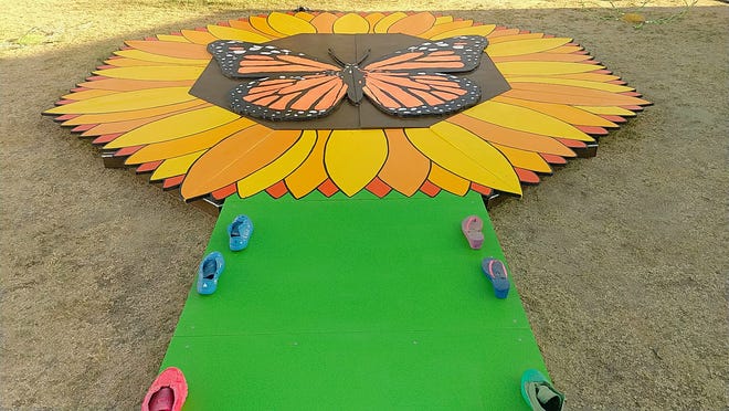 "Blooming Culture" was created by high school students from the eastern Coachella Valley in partnership with the local nonprofit Raices Cultura. It's displayed at the Coachella Valley Music & Arts Festival in Indio, Calif., in April 2022.