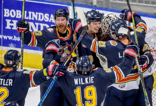 The Peoria Rivermen celebrate their 3-2 win over the Quad City Storm in Game 3 of the SPHL semifinals Saturday, April 23, 2022 at Carver Arena in Peoria. The Rivermen advance to the finals against the Roanoke Rail Yard Dawgs.