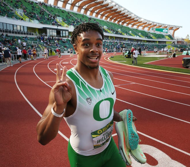 Micah Williams celebrates the Ducks' win in the men 4x100 relay during the Oregon Relays at Hayward Field last month.
