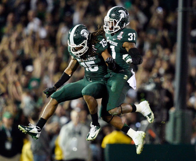 Darqueze Dennard, right, and Trae Waynes, here celebrating MSU's Rose Bowl win on Jan. 1, 2014, gave the Spartans two lockdown corners on perhaps the best defense in school history.