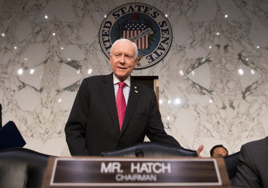 FILE - Senate Finance Committee Chairman Orrin Hatch, R-Utah, arrives to work on overhauling the nation's tax code, on Capitol Hill in Washington. Hatch, who became the longest-serving Republican senator in history as he represented Utah for more than four decades, died on Saturday, April 23, 2022, at age 88.