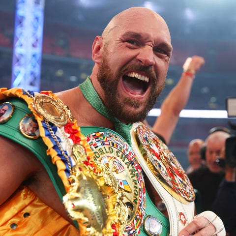 Tyson Fury celebrates his victory over Dillian Why
