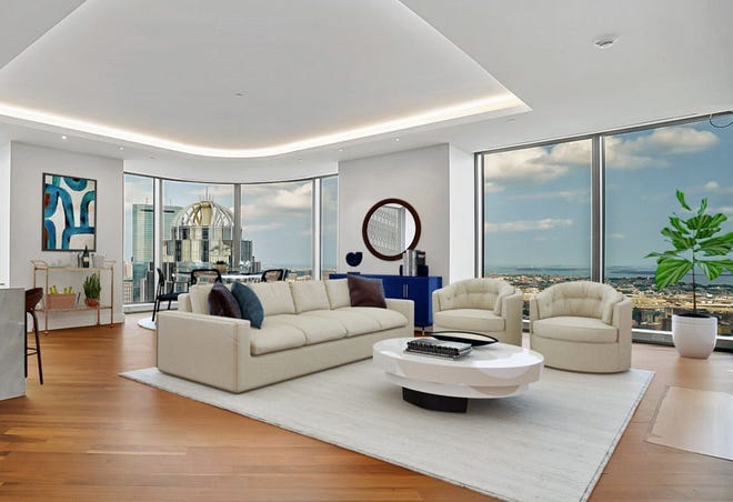 This space is wonderful place to unwind, relax and enjoy the great views out the large floor-to-ceiling windows.